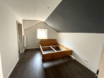 Schlafzimmer im OG - Kleines Reihenhaus in zentraler Lage von Berne!