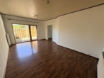 Wohnzimmer - Wüsting: 2-Zimmer-Erdgeschosswohnung mit Terrasse und Carport
