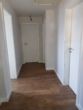 Flur (DG) - Hude-Nord: Kleines Einfamilienhaus mit Garten und Garage!