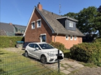 Rückansicht - Hude-Nord: Kleines Einfamilienhaus mit Garten und Garage!