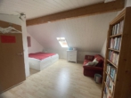 Spitzboden - Hude-Nord: Zentrales Reihenmittelhaus mit kleinem Garten und Garage!