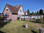 Rückansicht - Oldenburg-Bümmerstede: Einfamilienhaus mit Modernisierungsbedarf sucht neuen Eigentümer!