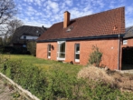 Außenansicht (Straßenseite) - Einfamilienhaus in Hude-Nord: Durchdachter Grundriss trifft auf zentrale Lage!