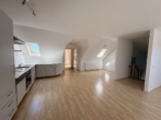 Offener Wohn-und Küchenbereich - Wüsting: 3-Zimmer-Obergeschosswohnung in ländlicher Lage mit Terrasse und Garage!